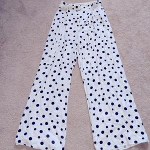 White and black polka dot high waisted pants.